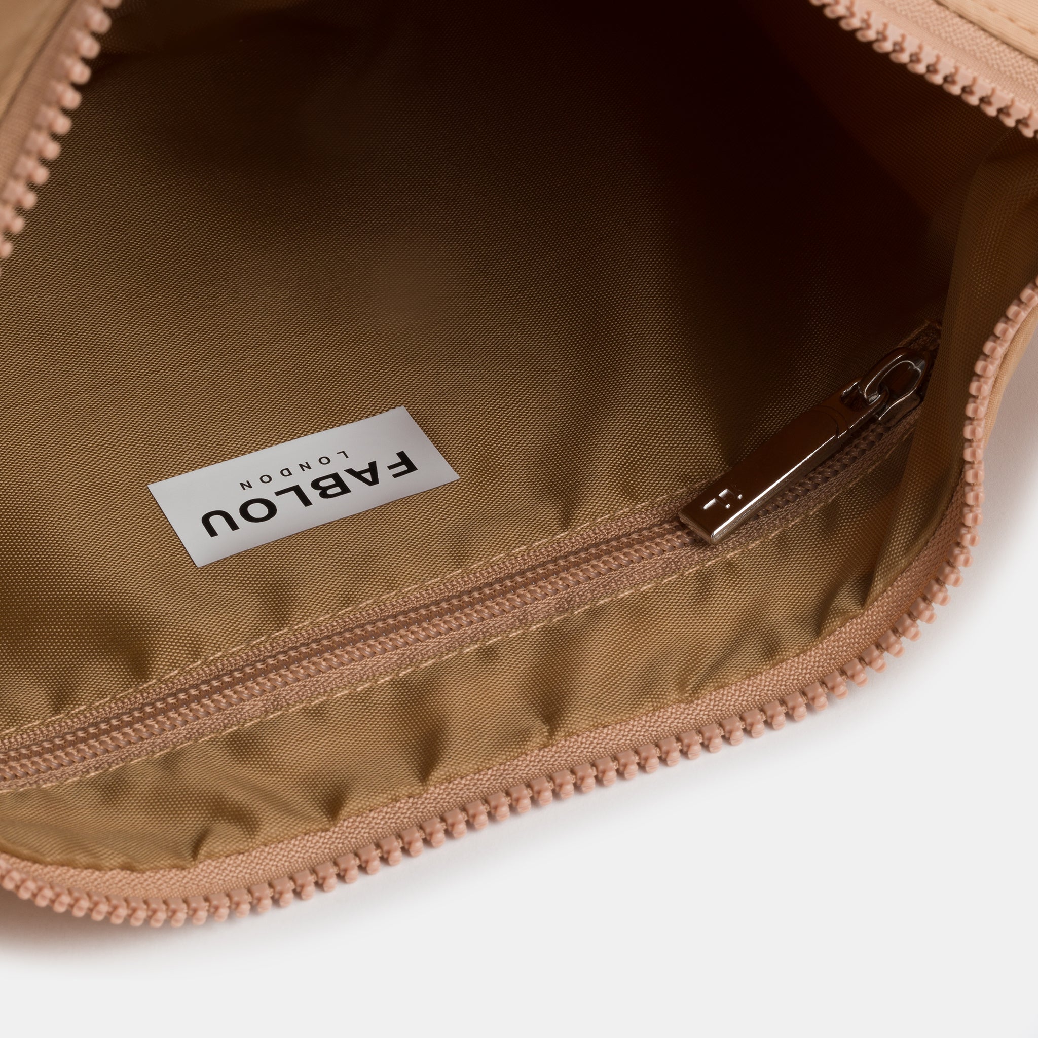 LUNA water-repellent crossbody bag with extra long strap in Bronze